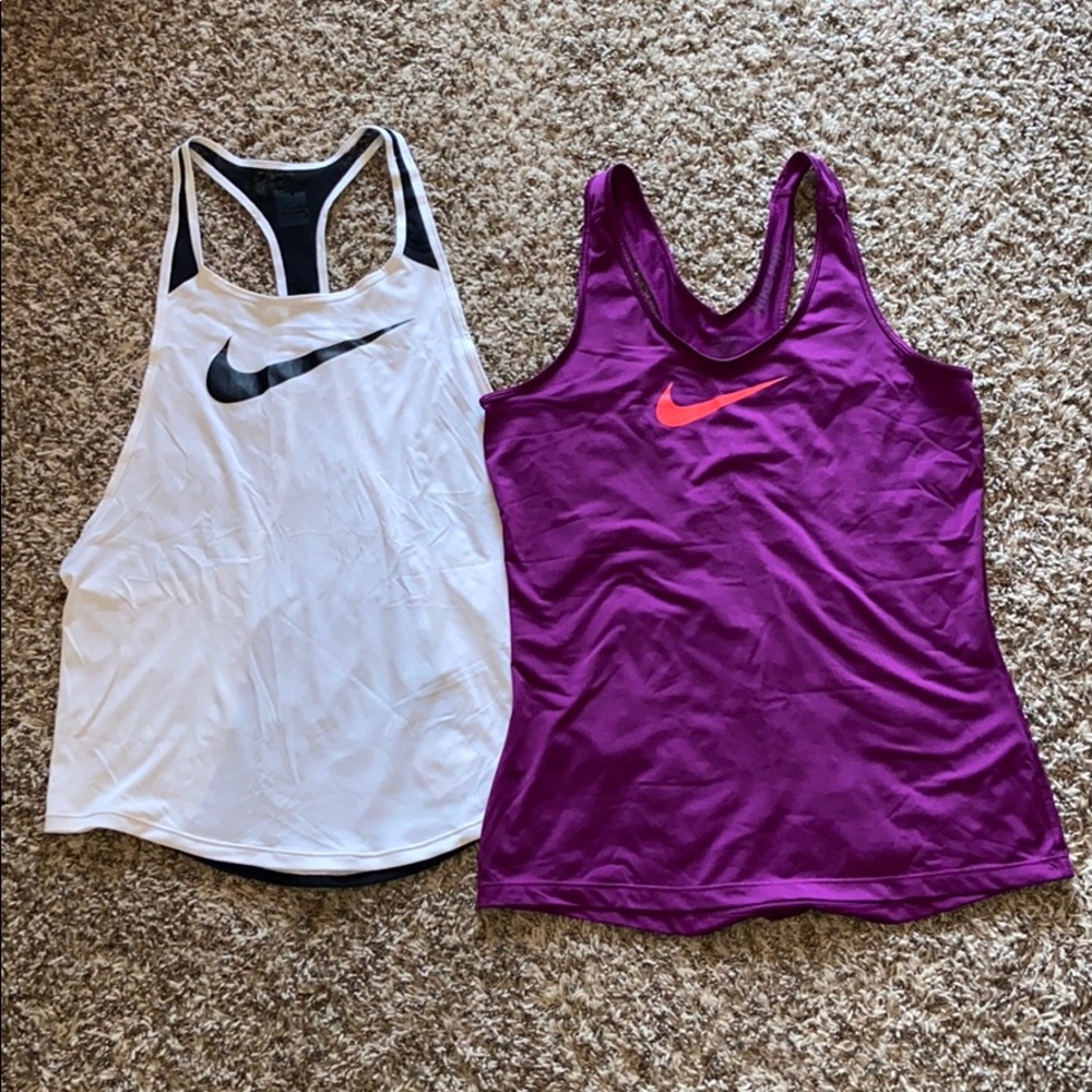 Two Nike workout tank tops